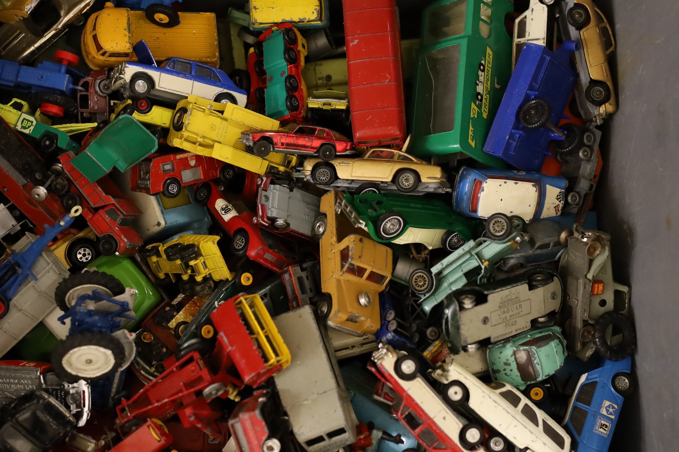 A large collection of used mixed die-cast toys